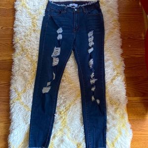 Woman’s Blue high rise ripped jeans size 9